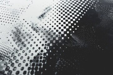 A detailed shot of a vintage black and white photograph with a textured finish