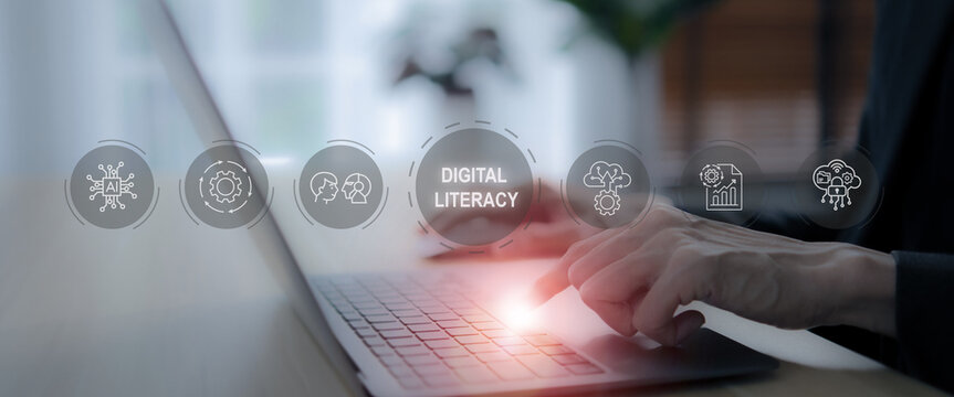 A person interacts with a laptop, surrounded by floating icons representing digital literacy, AI, and technology, highlighting the importance of digital skills and modern technological advancements.