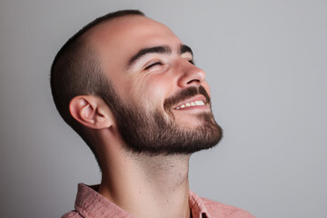 Obraz premium A close up of a man's face with his eyes closed