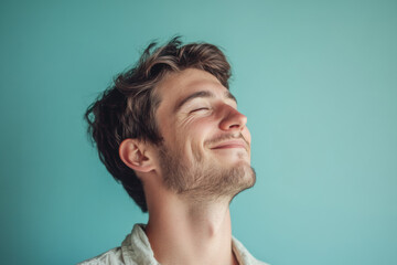 Obraz premium A close up of a man's face with his eyes closed