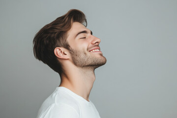 Obraz premium A close up of a man's face with his eyes closed