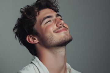 Fototapeta premium A close up of a man's face with his eyes closed