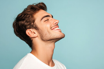 Obraz premium A close up of a man's face with his eyes closed