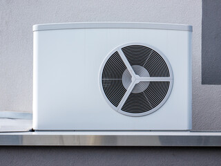 heat pump outside on a modern building