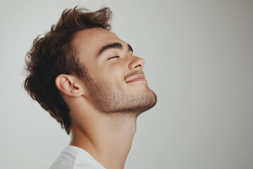 Obraz premium A close up of a man's face with his eyes closed
