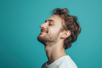 Fototapeta premium A close up of a man's face with his eyes closed