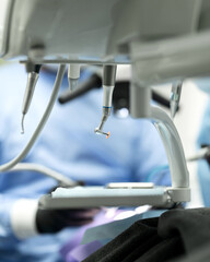 Dental mechanical instruments with different tips in dentist's office. Instruments with micromotor tips in dentist's office. Dental equipment in dentist's office. Side view. High quality photo