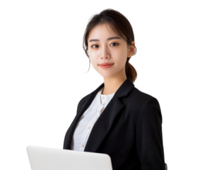 A young female Asian businesswoman in modern professional wear, using a laptop, white background.