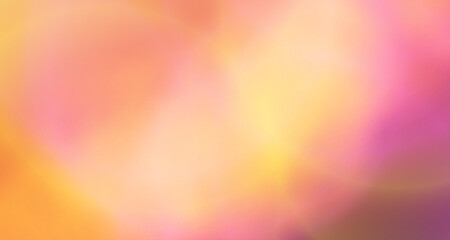 A blurred image showcasing a blend of purple and yellow light