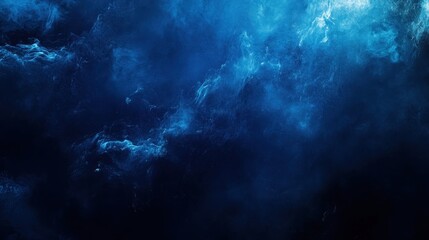 Fototapeta premium A deep blue abstract texture resembling ocean waves or water.