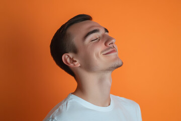 A close up of a man's face with his eyes closed