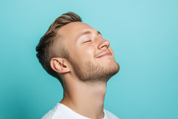 Fototapeta premium A close up of a man's face with his eyes closed