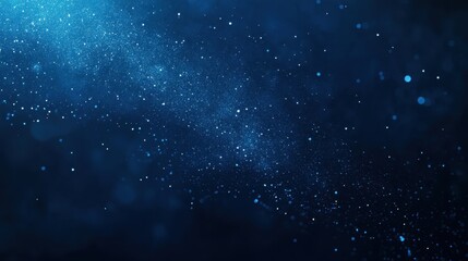 A mesmerizing blue abstract background with shimmering particles and depth.