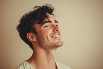 A close up of a man's face with his eyes closed