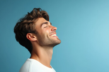 Fototapeta premium A close up of a man's face with his eyes closed