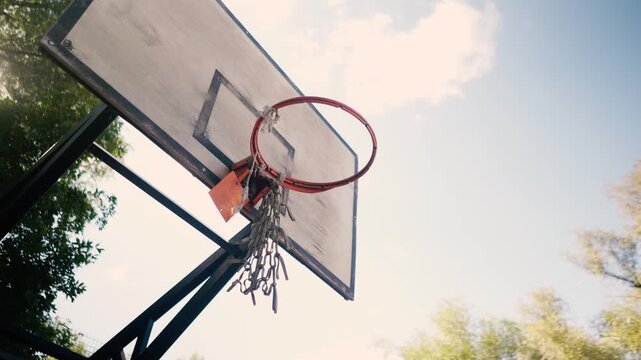 basketball court with backboard and hoop on beach, summer sunny atmosphere outdoors in nature
