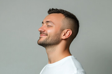 Fototapeta premium A close up of a man's face with his eyes closed