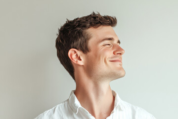 Fototapeta premium A close up of a man's face with his eyes closed