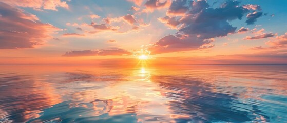 Fototapeta premium Tranquil Sunset Seascape with Clouds Reflection - Ideal for Travel and Relaxation