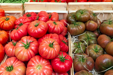 Fresh Heirloom Tomatoes at Farmers Market Stall