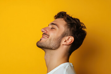 Obraz premium A close up of a man's face with his eyes closed