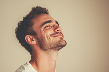 Obraz premium A close up of a man's face with his eyes closed