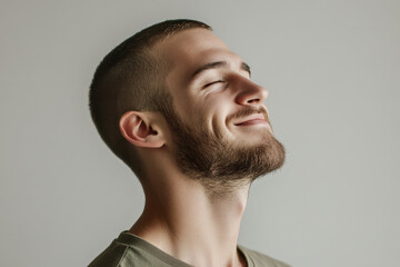 Obraz premium A close up of a man's face with his eyes closed