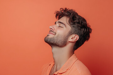 Obraz premium A close up of a man's face with his eyes closed