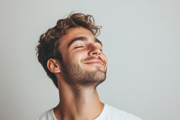 Fototapeta premium A close up of a man's face with his eyes closed
