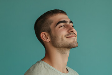 Obraz premium A close up of a man's face with his eyes closed