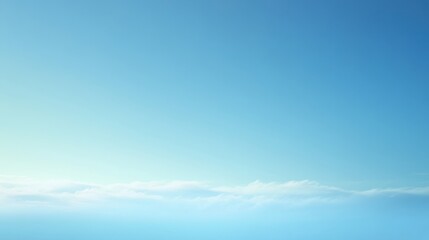 Obraz premium A serene blue sky with soft clouds, evoking tranquility and openness.