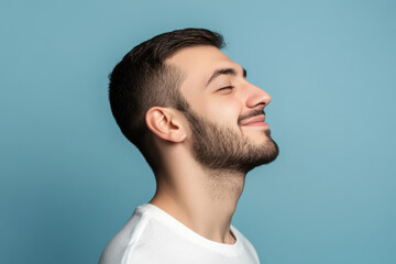 Fototapeta premium A close up of a man's face with his eyes closed