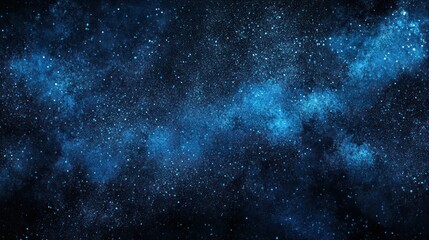 Obraz premium Blue Glitter Scattered Across a Dark Background