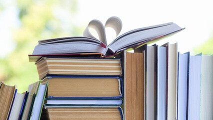A simple composition of many hardback books. Going back to school. Education.