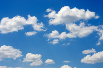 Naklejka premium White clouds in blue sky