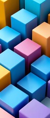 Obraz premium A vibrant arrangement of colorful cubes creates a visually striking pattern, perfect for backgrounds or artistic designs.