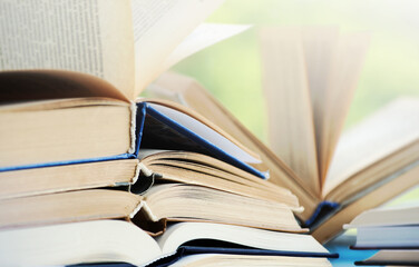 A simple composition of many hardback books. Going back to school. Education.