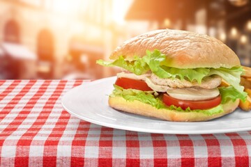 Tasty hot cheese beef burger on desk