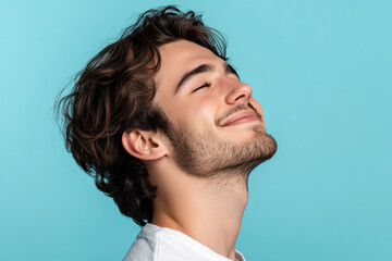 Fototapeta premium A close up of a man's face with his eyes closed