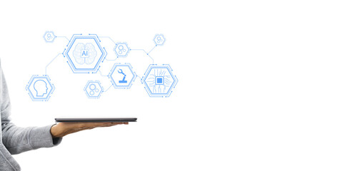 Man's hand holding tablet with artificial intelligence icons. Minimalist style, white background....