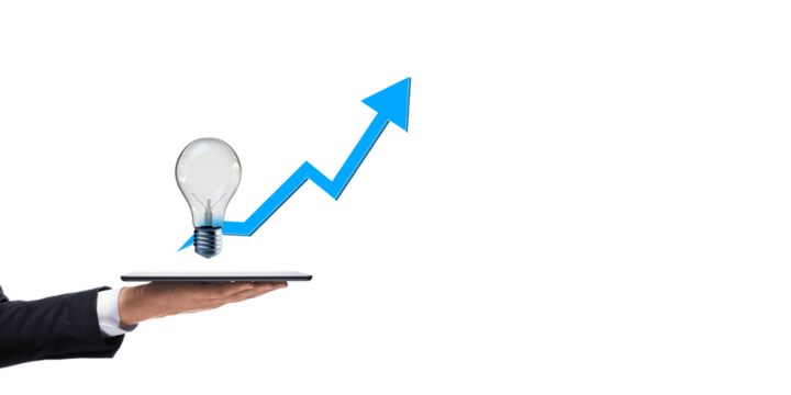 Businessman's hand holding a tablet with a light bulb and blue arrow pointing upwards on a white background. Concept of business growth and innovation