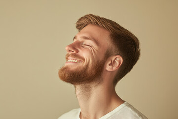 Obraz premium A close up of a man's face with his eyes closed