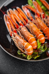 langoustine seafood shrimp prawns fresh meal food snack on the table copy space food background rustic top view