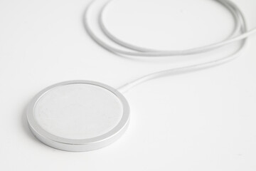 Wireless magnetic charger, modern equipment for mobile phone.