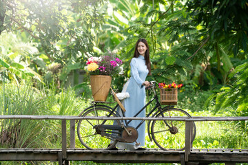 Beautiful Asian women in traditional Vietnam fashion dress.