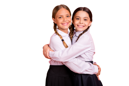 Portrait of two person nice attractive charming cute winsome sweet lovely cheerful cheery pre-teen girls buddy fellow isolated over bright vivid shine orange background