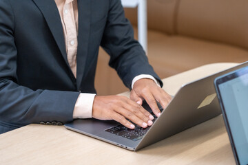 Professional businessperson working on a laptop