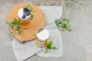 Kombucha Lemon balm beverage. Trendy natural product, healthy lifestyle. Organic probiotic drink