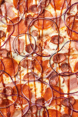 the macro composition of pizza for the menu. fresh ingredients are cheese, ham and tomatoes.