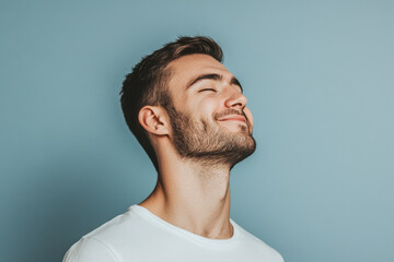 Obraz premium A close up of a man's face with his eyes closed